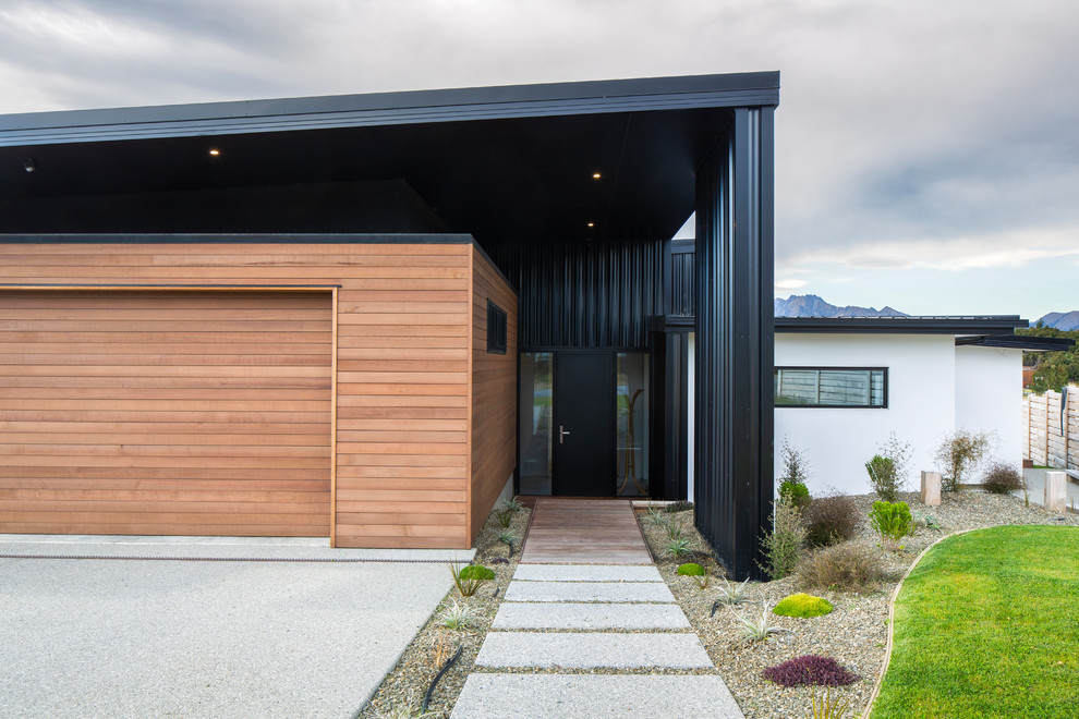 Modernes Einfamilienhaus mit Mix-Fassade und Blechdach in Sonstige