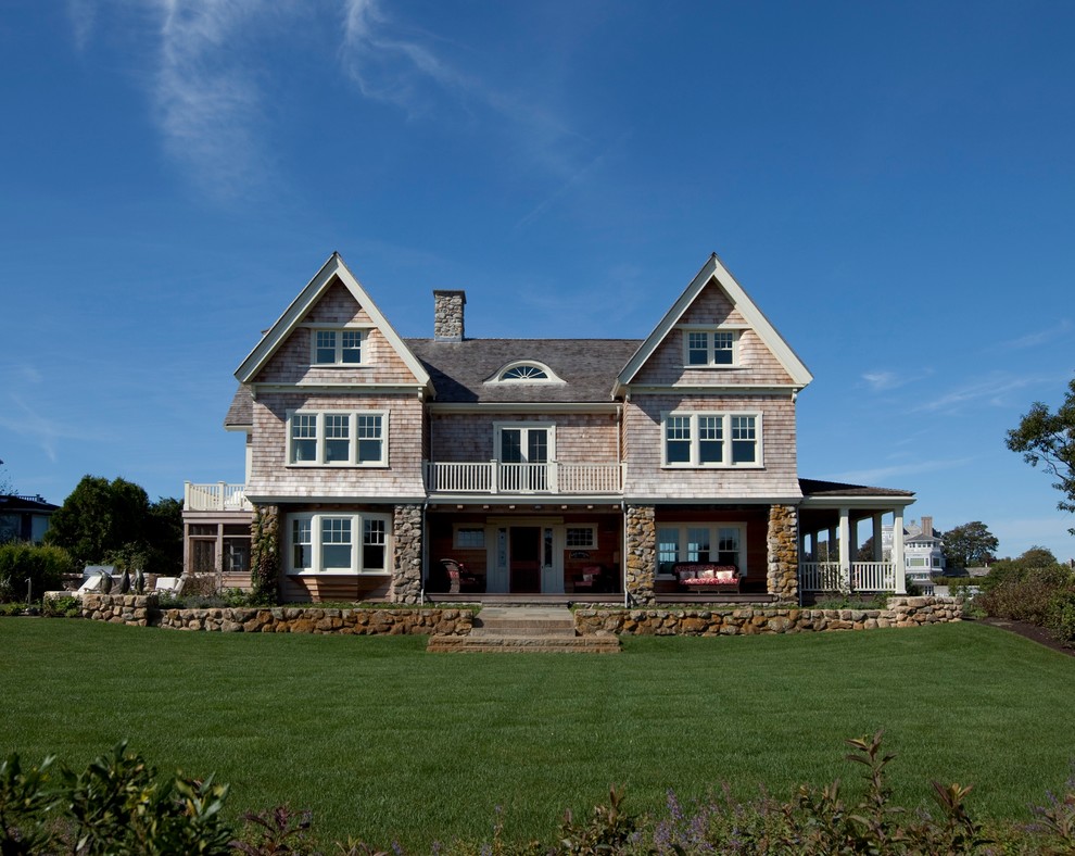 Victorian house exterior in Boston with three floors and a pitched roof.