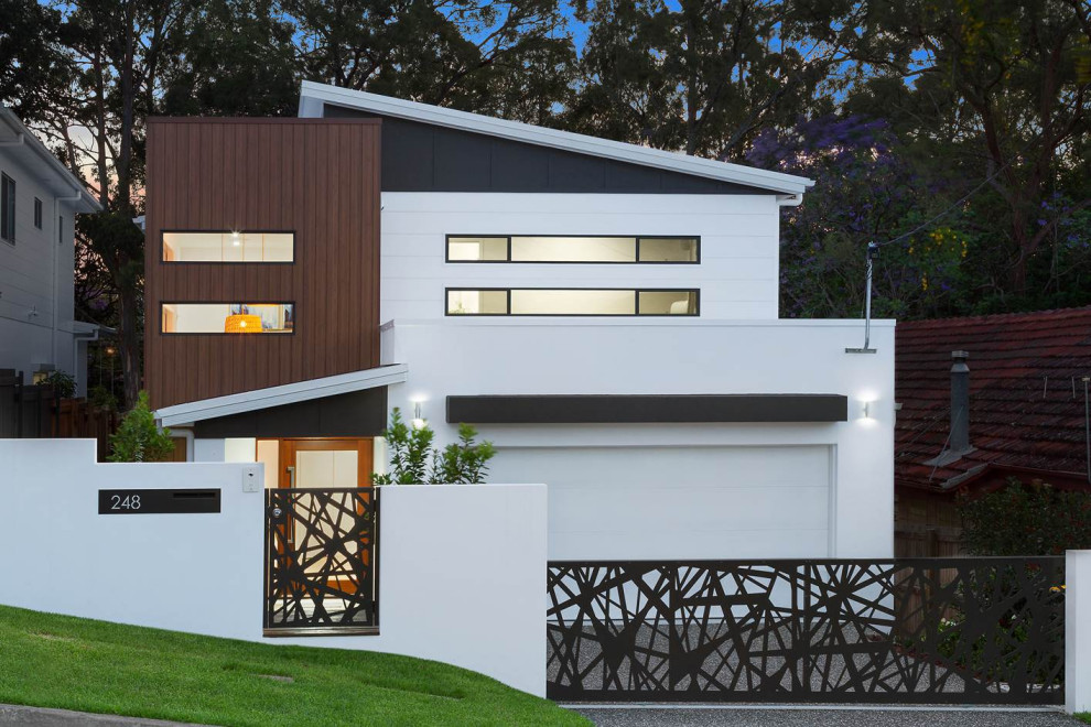 Photo of a large and white contemporary two floor brick detached house in Brisbane with a butterfly roof and a metal roof.