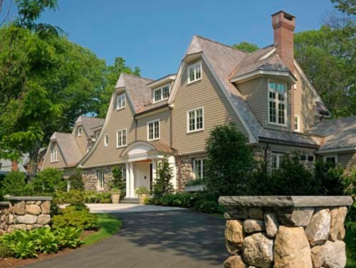 Large transitional beige three-story wood gable roof idea in Boston