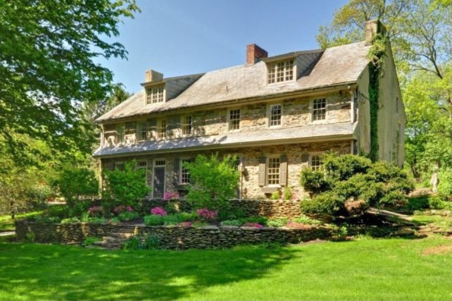 Inspiration for a mid-sized timeless gray three-story stone exterior home remodel in Philadelphia with a shingle roof