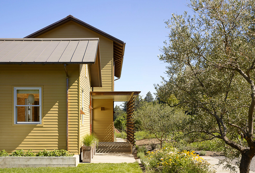 Photo of a yellow rural house exterior in San Francisco.