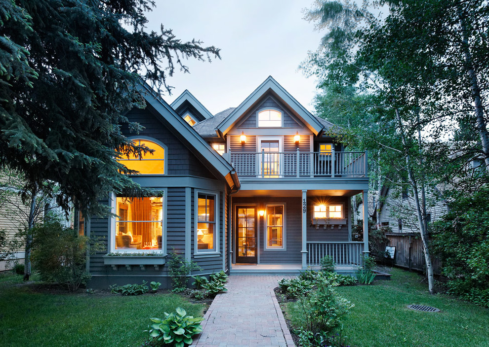 Inspiration for a timeless gray two-story exterior home remodel in Denver