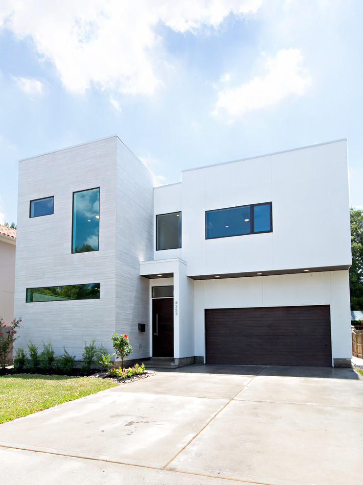 White contemporary two floor house exterior in Houston.