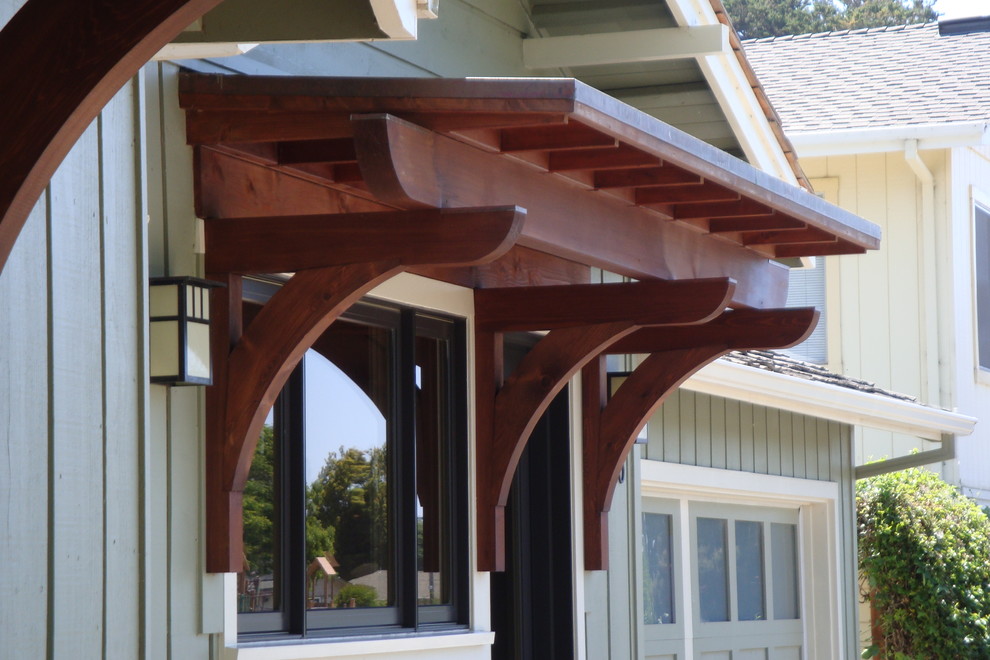 Inspiration for a large craftsman blue one-story wood gable roof remodel in San Francisco