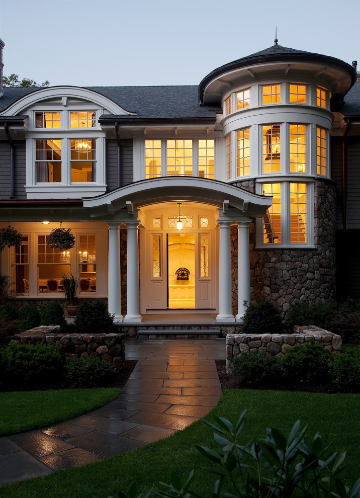 Inspiration for a classic house exterior in Boston with stone cladding.