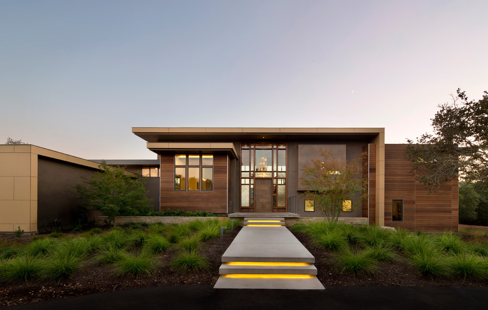 Modern two floor concrete house exterior in San Francisco with a flat roof.