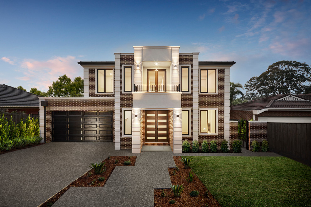 Inspiration for a transitional brown two-story brick exterior home remodel in Melbourne