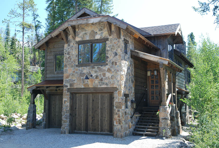 Inspiration for a rustic house exterior in Denver.