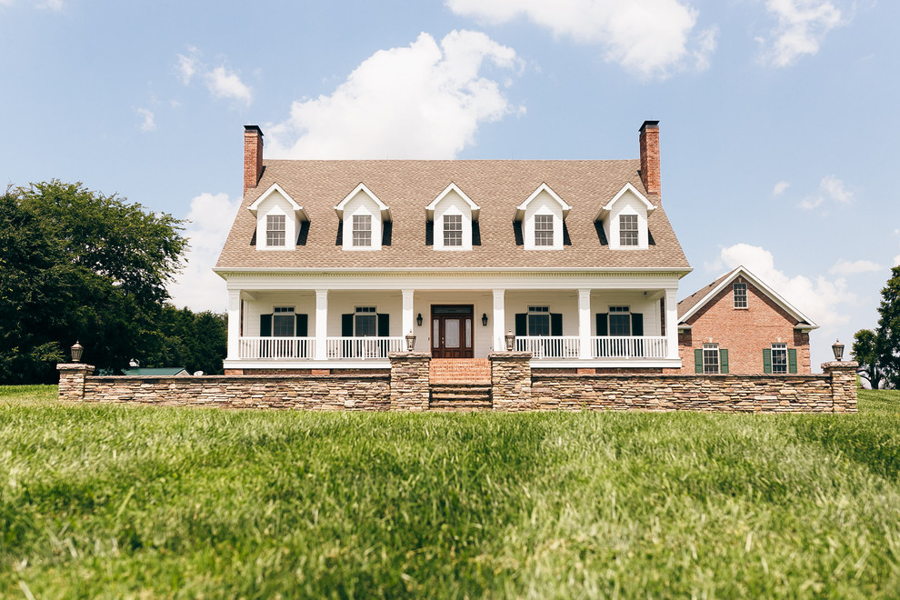 Inspiration for a farmhouse white two-story gable roof remodel in Louisville