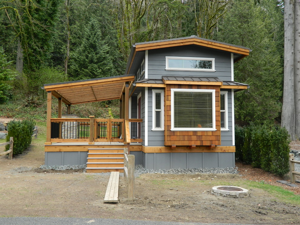 Photo of a small and gey traditional house exterior in Seattle with mixed cladding.
