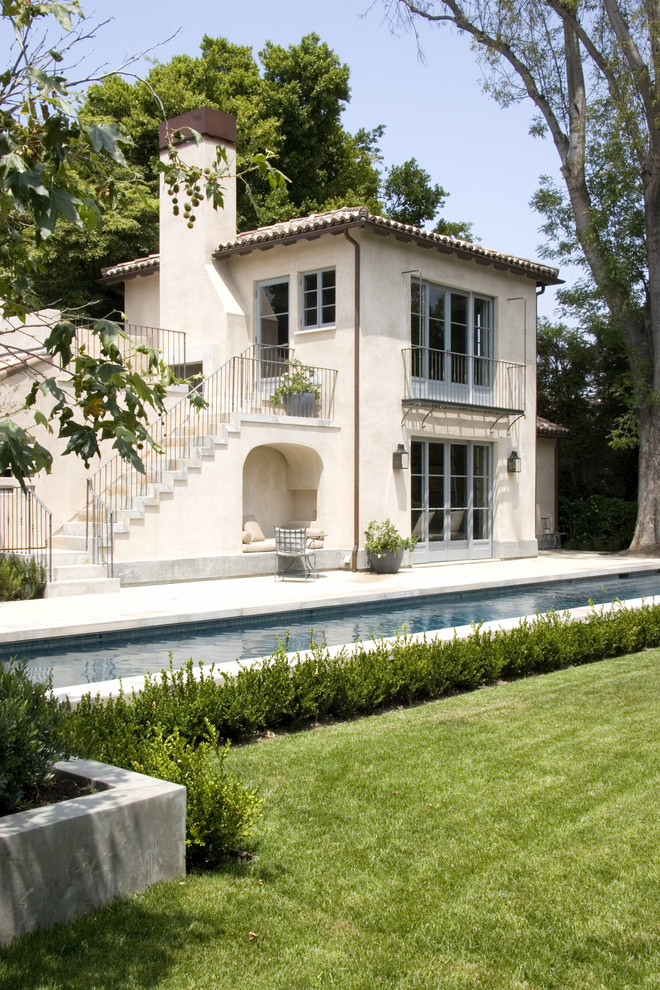 Photo of a mediterranean two floor house exterior in Los Angeles.