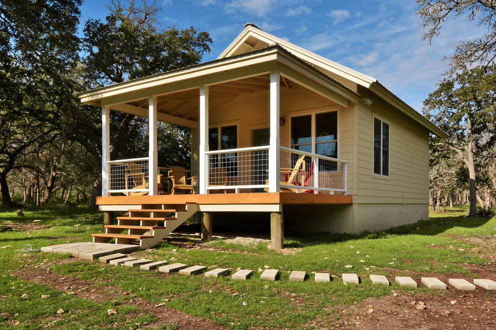 Design ideas for a rustic house exterior in Austin.