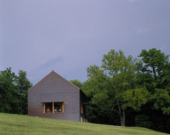 Design ideas for a rural house exterior in Kansas City with metal cladding.