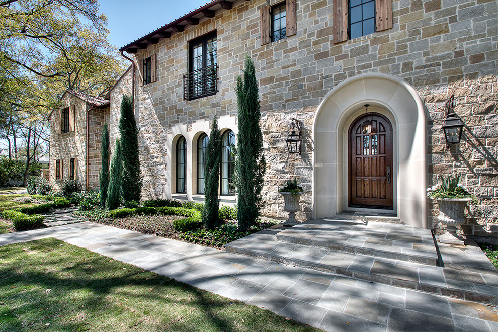 Inspiration for a timeless stone exterior home remodel in Houston