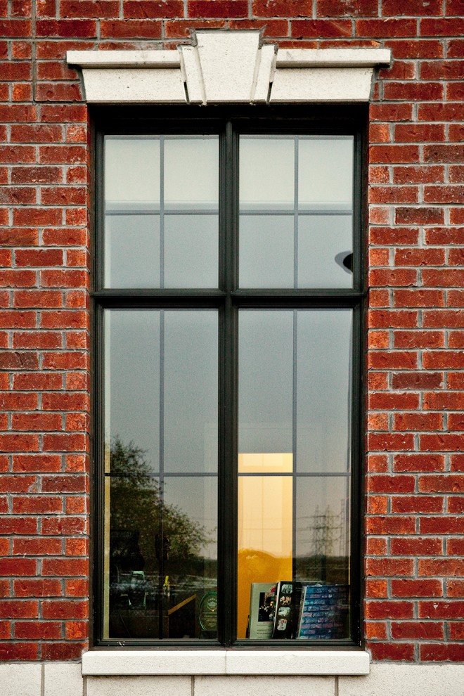 Photo of a multi-coloured classic brick house exterior in Orange County.