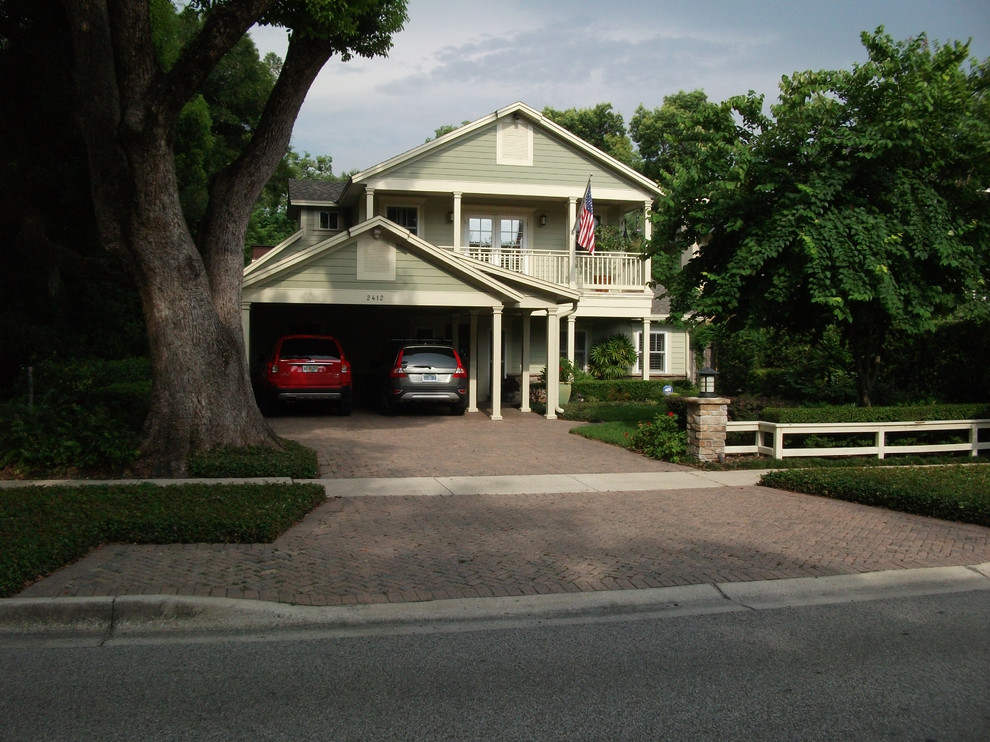 Inspiration for a medium sized beach style two floor house exterior in Orlando with concrete fibreboard cladding.