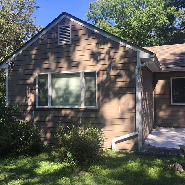 wood house with Rotted and peeling Paint House Exterior New York