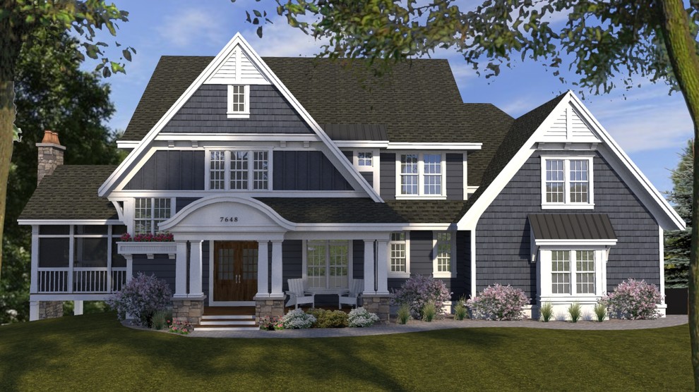 Inspiration pour une grande façade de maison bleue traditionnelle à un étage avec un revêtement mixte.