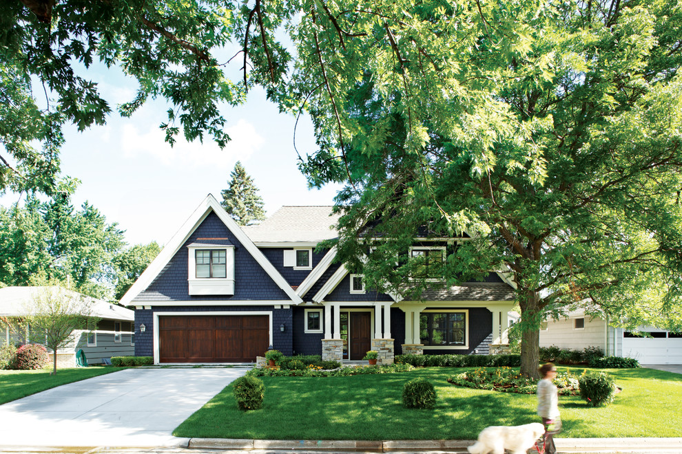 Elegant blue two-story wood gable roof photo in Minneapolis