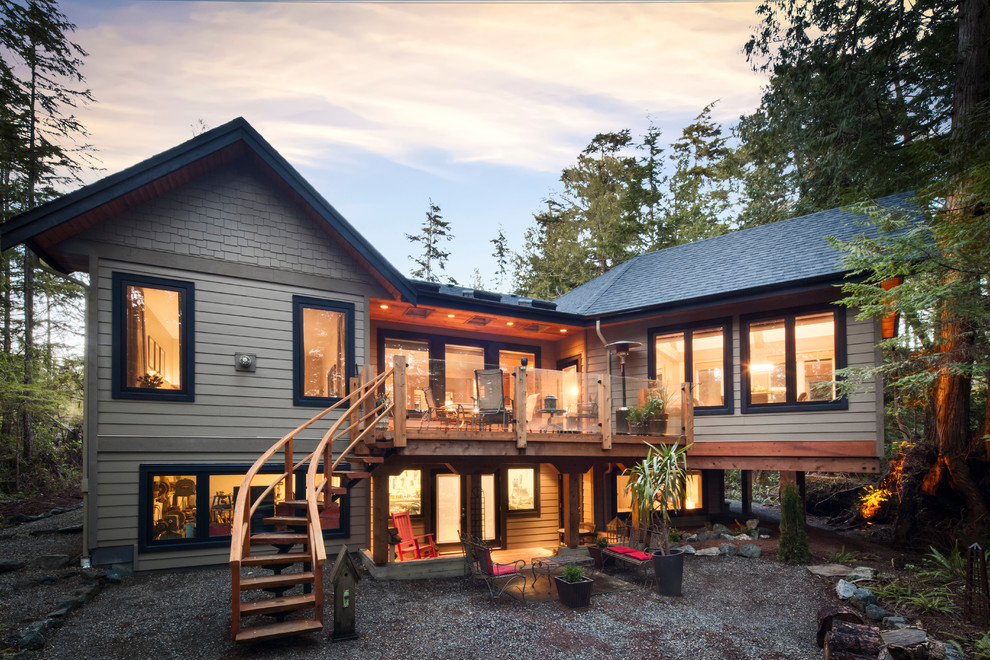 Inspiration for a traditional house exterior in Vancouver with wood cladding.