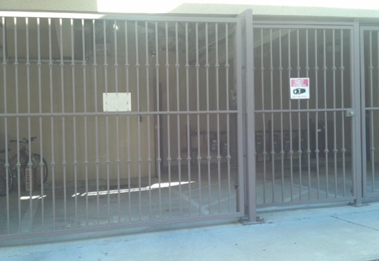 Photo of a modern metal fence gate in Los Angeles.