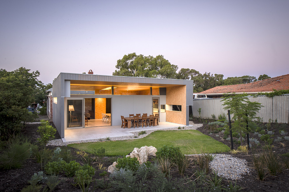Modern bungalow house exterior in Perth with wood cladding and a flat roof.