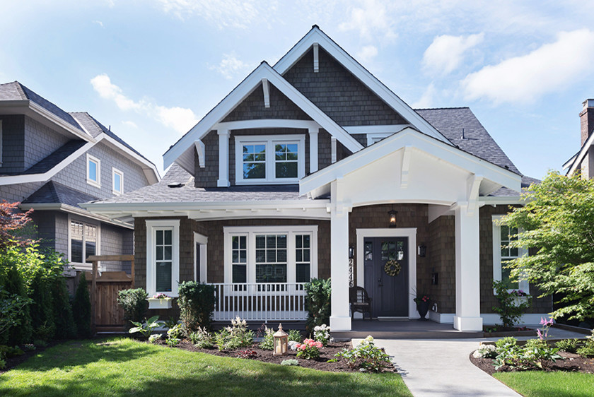 Mid-sized elegant gray one-story wood exterior home photo in Vancouver with a shingle roof