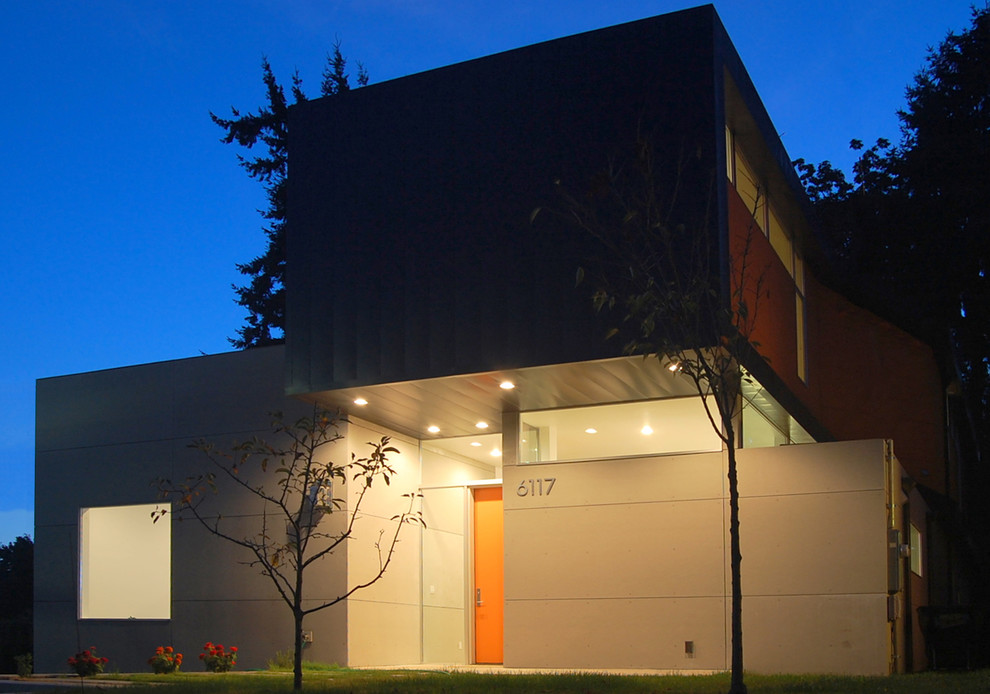 Example of a mid-sized minimalist two-story exterior home design in Seattle