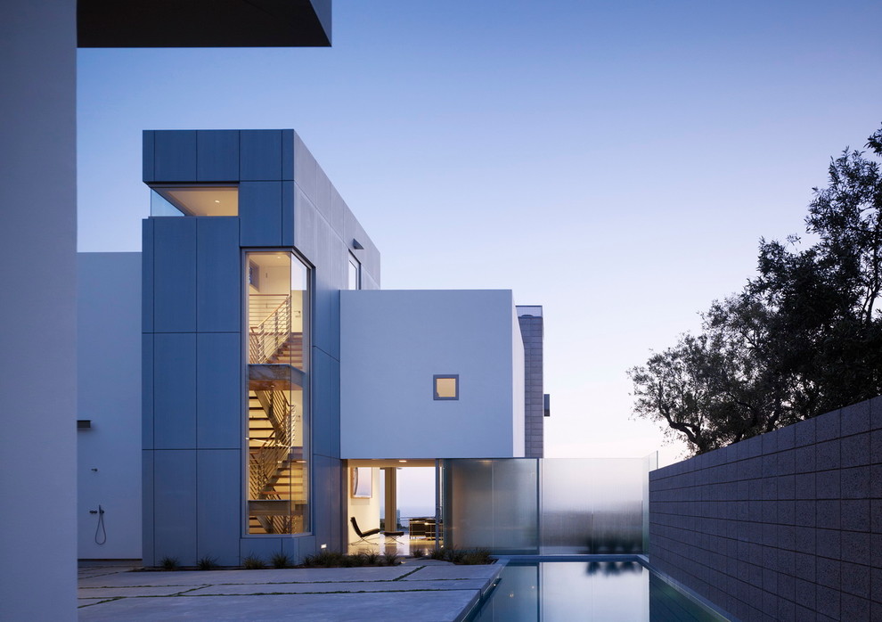 Minimalist white two-story stucco exterior home photo in San Francisco
