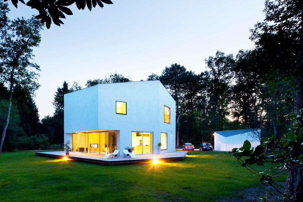 Стильный дизайн: дом в современном стиле с двускатной крышей - последний тренд