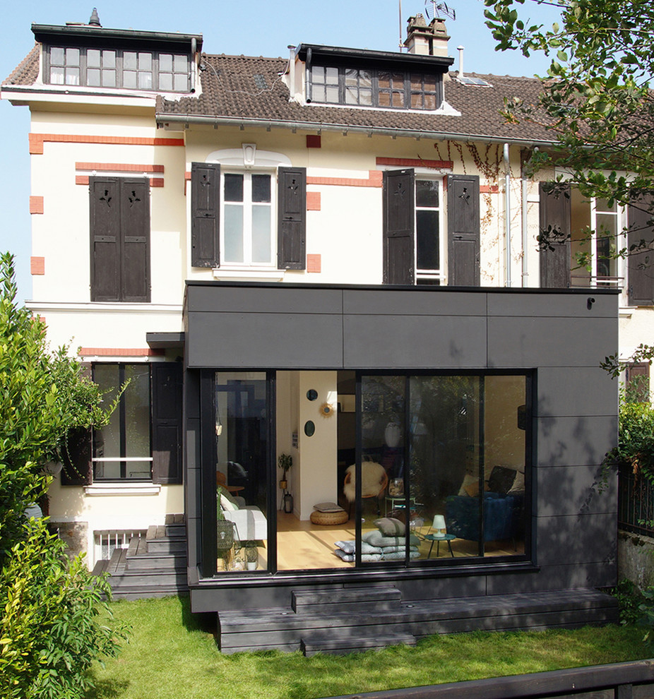 Inspiration for a medium sized and beige contemporary terraced house in Paris with three floors, a pitched roof and a tiled roof.