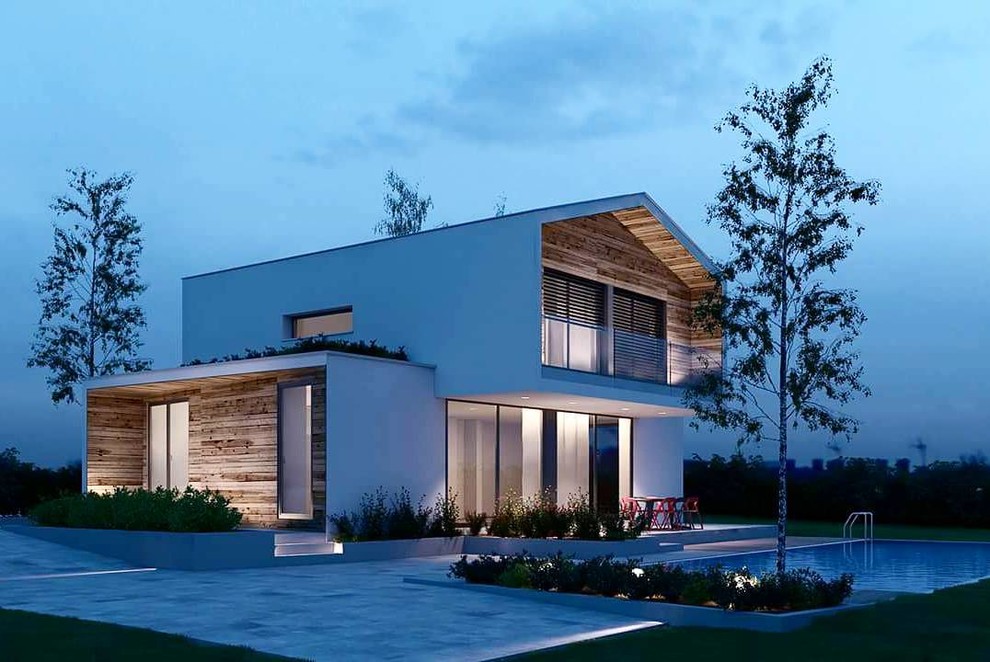 This is an example of a medium sized and white contemporary two floor house exterior in Venice with mixed cladding and a pitched roof.