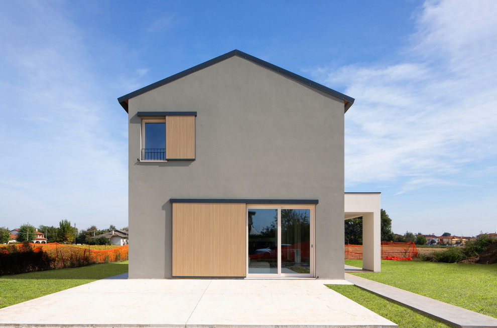 Gey contemporary two floor detached house in Other with a pitched roof.