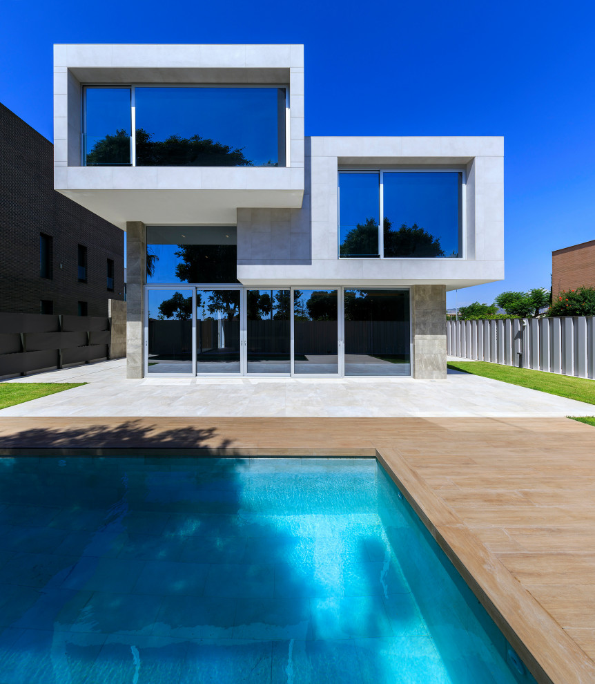 This is an example of a contemporary detached house in Other.