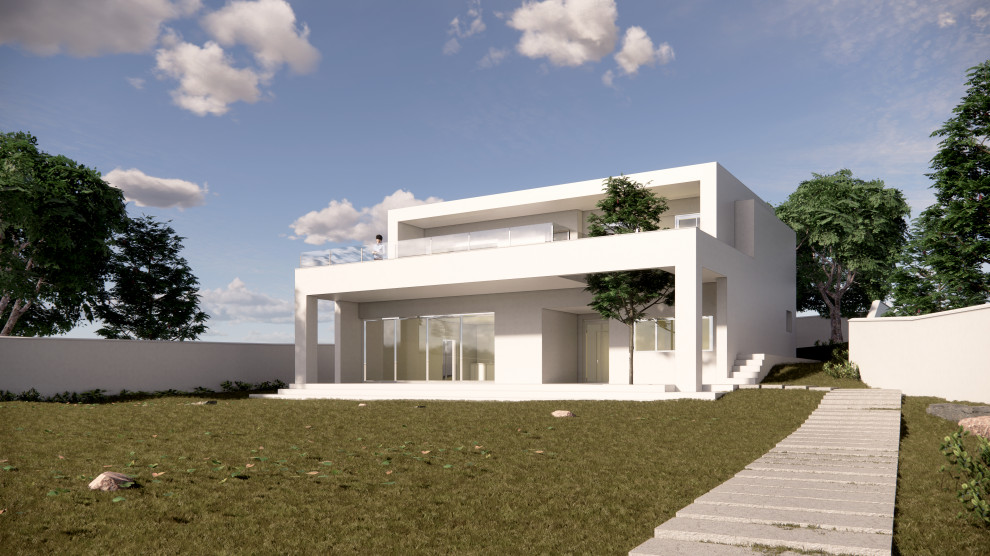 Idée de décoration pour une façade de maison blanche minimaliste en panneau de béton fibré de taille moyenne et à un étage avec un toit plat et un toit mixte.