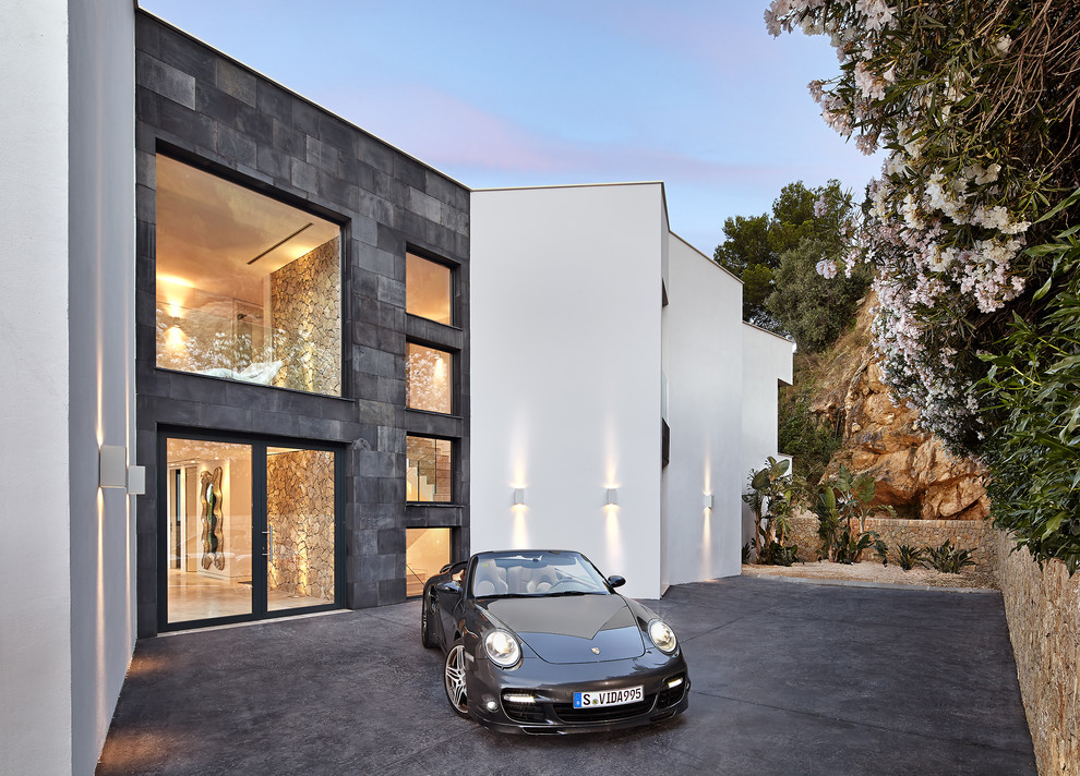 Large contemporary white two-story mixed siding exterior home idea in Palma de Mallorca