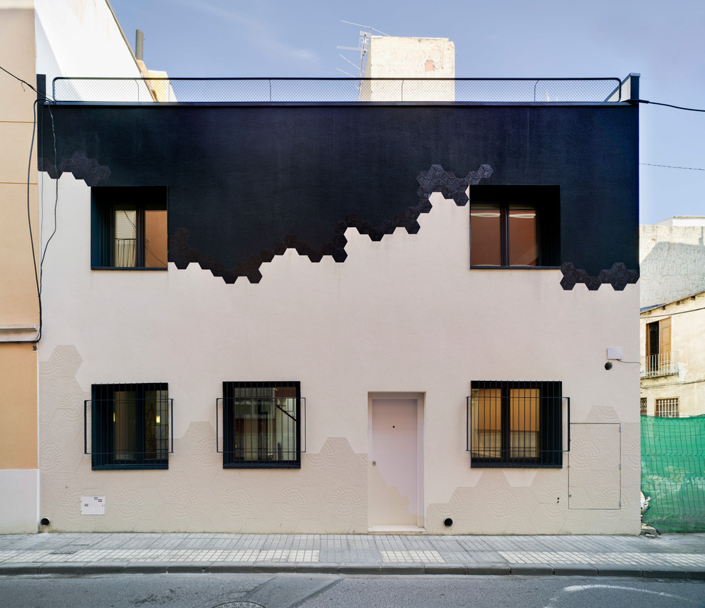 Example of a mid-sized minimalist multicolored two-story mixed siding exterior home design in Alicante-Costa Blanca