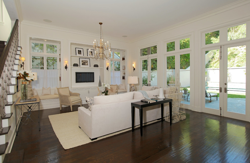 Example of a classic family room design in Los Angeles
