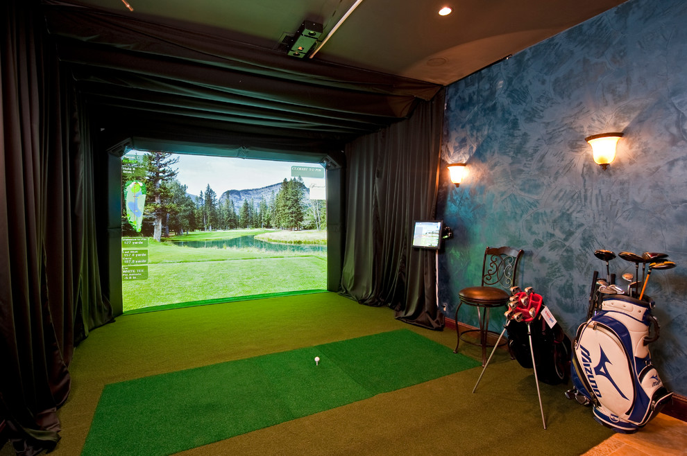 This is an example of an expansive classic open plan games room in Austin with a game room, blue walls and carpet.