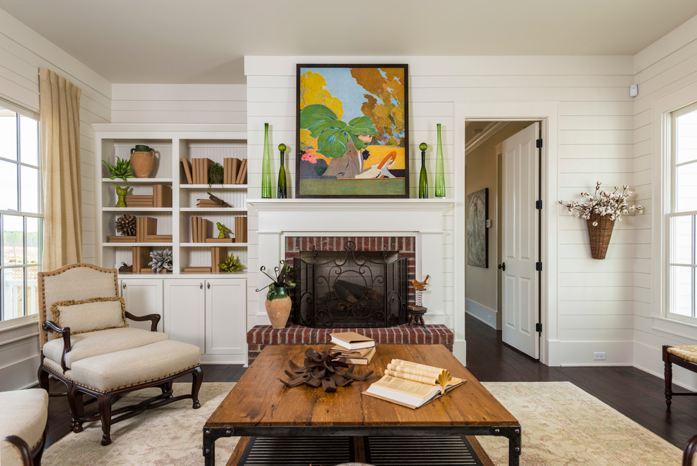 Example of a classic family room design in Atlanta with white walls