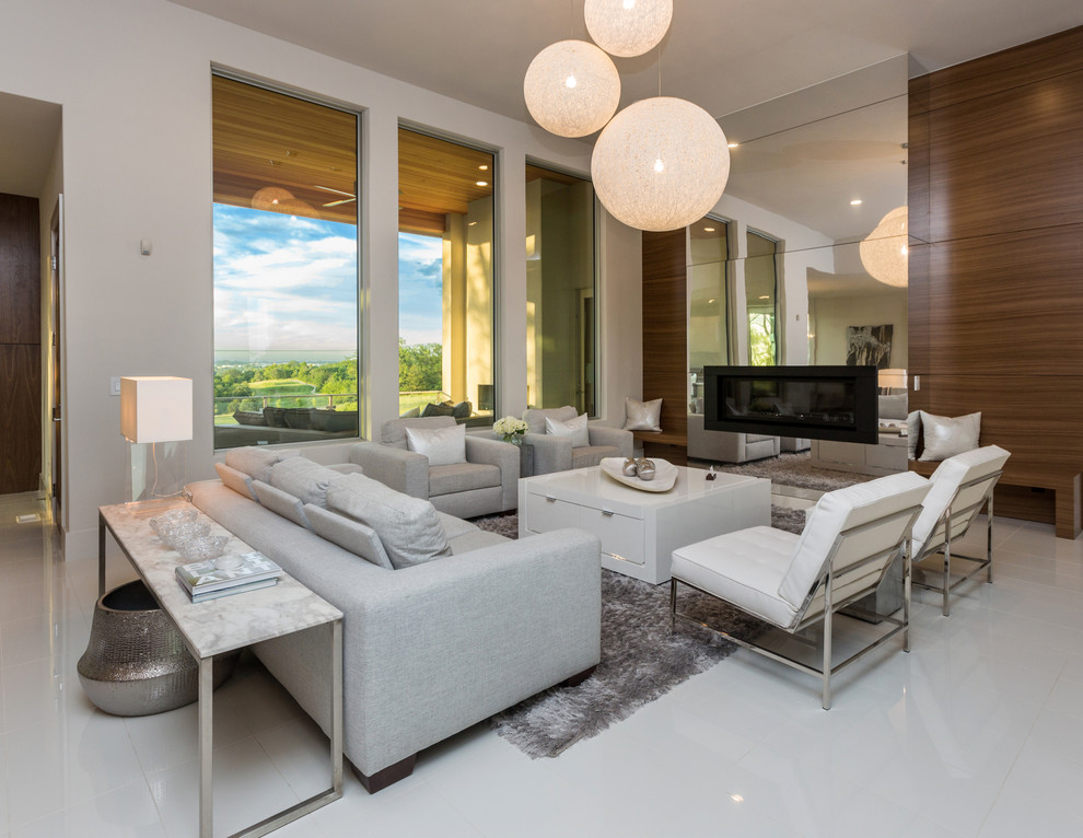 Modelo de sala de estar abierta minimalista grande con suelo de baldosas de porcelana
