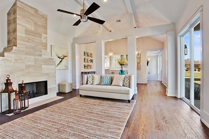 Example of an island style family room design in New Orleans