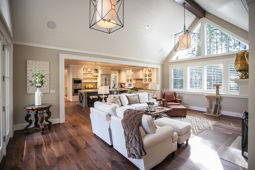 Medium sized traditional open plan games room in Portland with grey walls, dark hardwood flooring, a standard fireplace, a stone fireplace surround, a built-in media unit and brown floors.