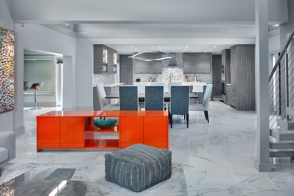 Example of a large minimalist open concept marble floor and white floor family room design in Miami with white walls and no tv