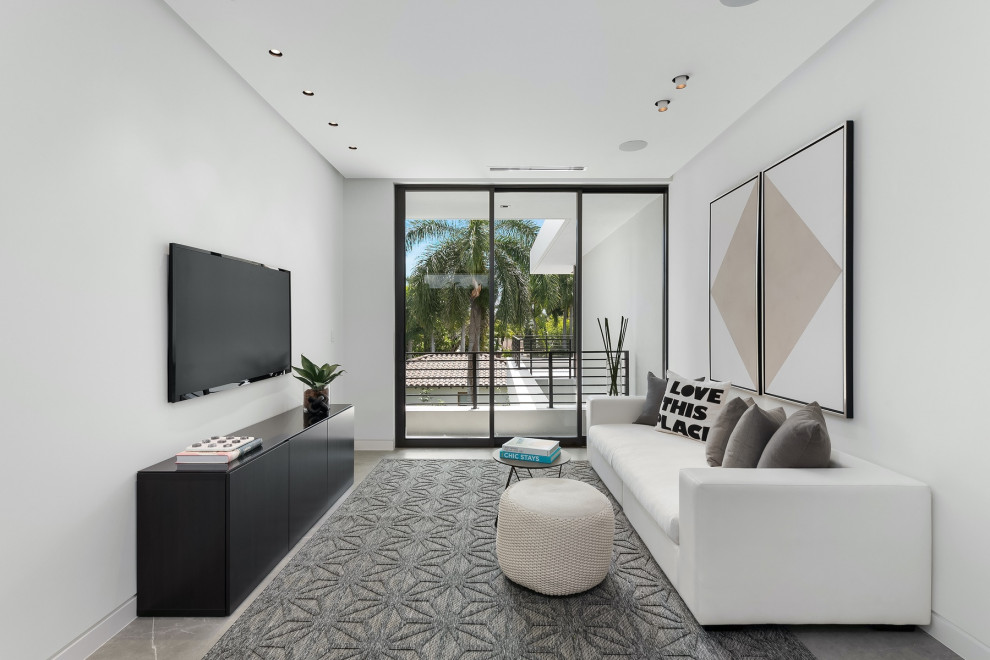 Family room - modern family room idea in Miami