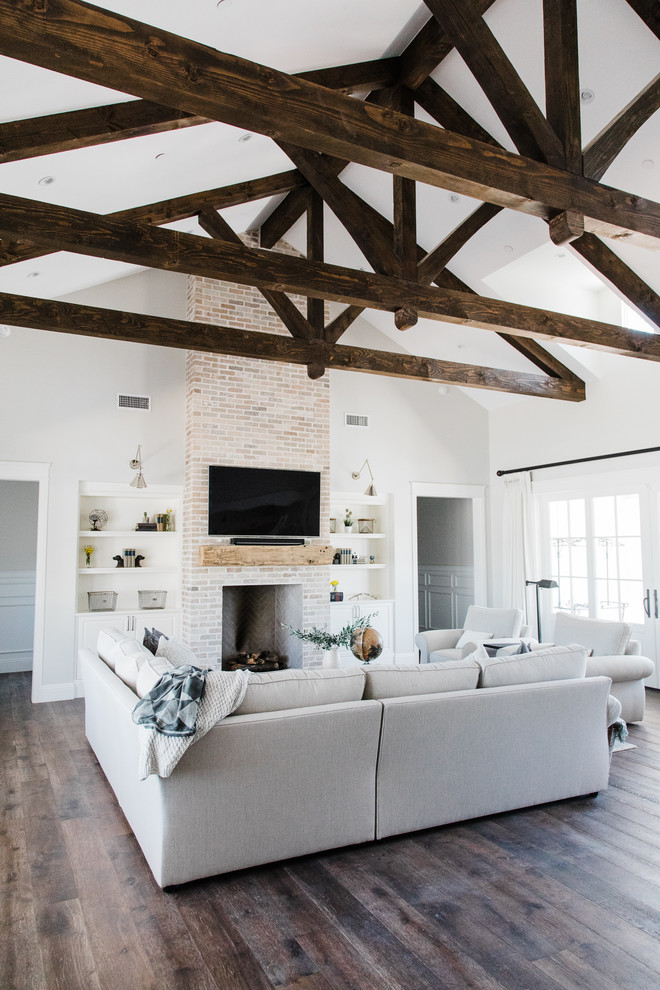 Example of a farmhouse family room design in Phoenix