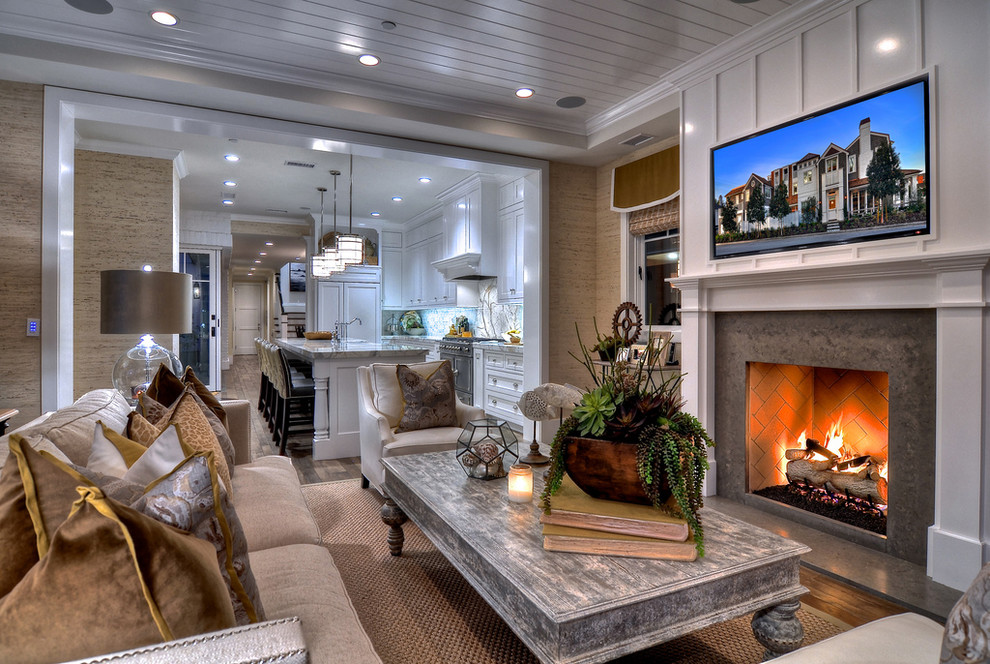 Design ideas for a traditional games room in Orange County with a stone fireplace surround.