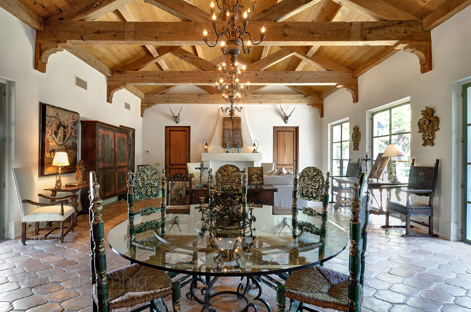 Example of a tuscan family room design in Houston
