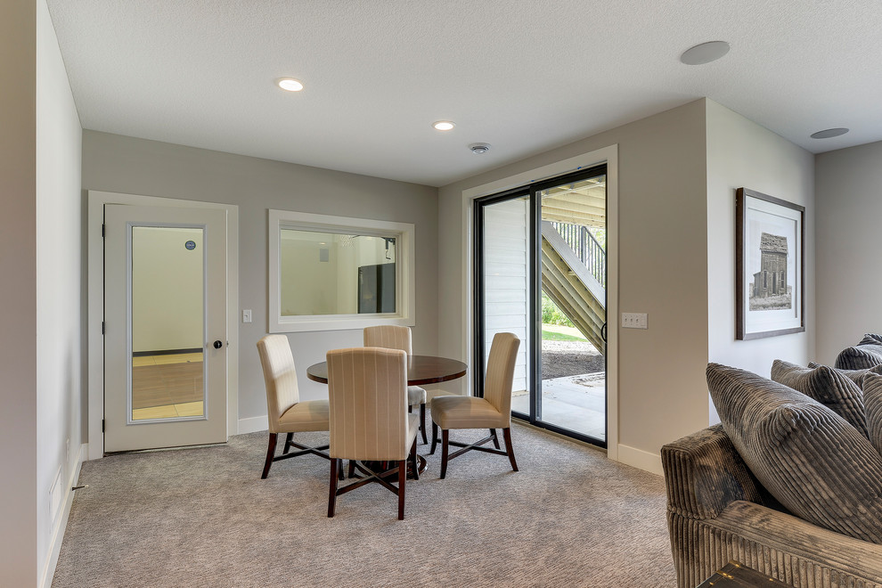 Photo of a medium sized country open plan games room in Minneapolis with a home bar, grey walls, carpet and grey floors.